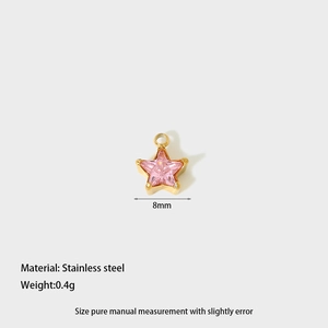Detail view of a small 8mm pink star-shaped stainless steel pendant with gold plating