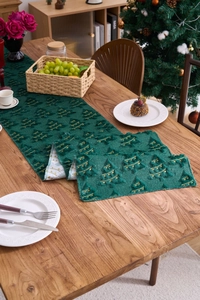 Deep green Christmas table runner featuring 3D embroidered trees and gold stars