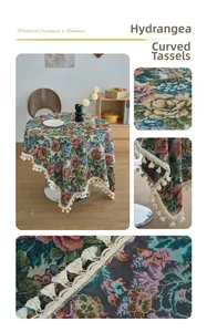 Detail of pastoral hydrangea pattern fabric with curved fringe tassels on table cloth