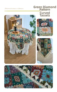 Detail of green diamond weave tablecloth with elegant scalloped fringe and lace layering