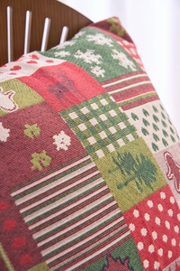 Detailed close-up of Christmas jacquard pillow cover featuring festive woven patterns