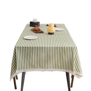 Green and white striped cotton tablecloth with elegant white lace trim for dining tables