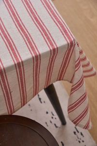 Detailed macro view of the red striped cotton linen tablecloth showing thick fabric texture