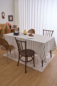 Detailed texture of cotton linen rectangular tablecloth with grey vertical stripes