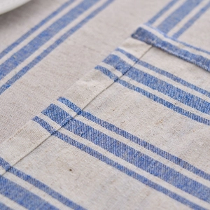 Linen cotton tablecloth with blue and white stripes and delicate lace border edges