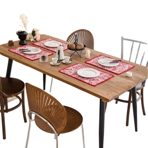 Set of 4 red floral jacquard placemats with festive embroidery and woven borders