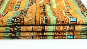 Close-up of ethnic geometric jacquard fabric showing thick woven texture and colors