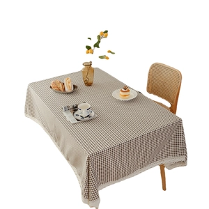 Brown and white plaid rectangle tablecloth with delicate white lace edges for home dining