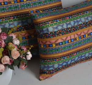 Close-up of Bohemian decorative pillowcase with colorful ethnic geometric patterns