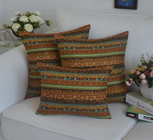 Detailed set of three bohemian throw pillow covers with colorful ethnic geometric patterns