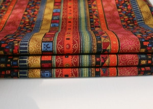 Detail of ethnic pattern cotton linen table runner with bohemian geometric texture