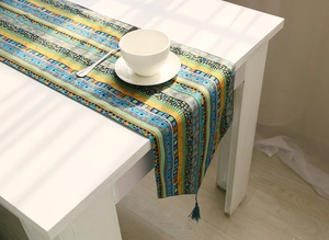 Ethnic style cotton linen table runner with bohemian patterns and blue fringe tassels