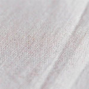 Natural linen placemat with textured weave and durable heat-resistant cotton fabric
