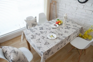 Detail of American country style tablecloth with butterfly print and beige lace trim