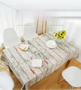 Close-up of rustic wood grain pattern on cotton linen tablecloth for dining tables