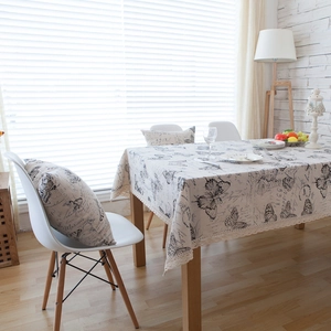 Linen table cloth with butterfly patterns, French letters, and elegant lace edges