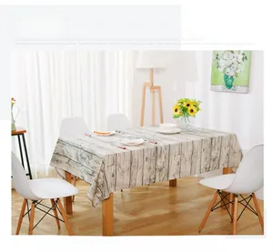 Detailed view of rectangular tablecloth featuring retro wood grain pattern in a cozy room
