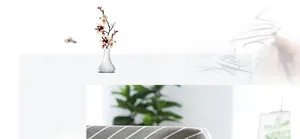 Macro detail of grey linen tablecloth with white geometric arrow patterns and texture