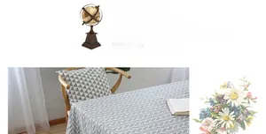 Detail shot of the gray and white geometric arrow pattern on the cotton linen tablecloth