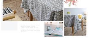 Macro detail of Nordic linen cotton tablecloth showing grey herringbone texture on wood table