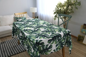 Nappe imperméable et housses de coussin assorties avec imprimé feuilles de monstera