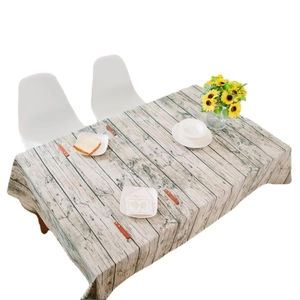 Minimalist rectangular table cloth with vintage gray wood grain print in a dining setting