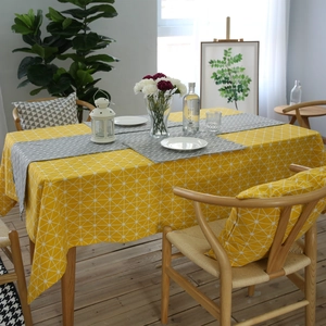 Modern cotton linen tablecloth with yellow star pattern and matching grey table runner