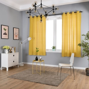 Detail of yellow geometric pattern semi-blackout linen curtain with metal grommets