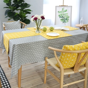Minimalist geometric cotton linen tablecloth with yellow runner and matching placemats