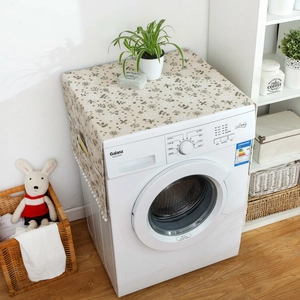 Grey linen washing machine dust cover with floral pattern and side storage pockets