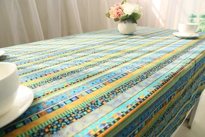 Detail of bohemian cotton linen tablecloth with ethnic geometric patterns and stripes