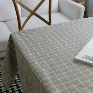 Modern grey plaid linen tablecloth with elegant texture for minimalist dining room decor
