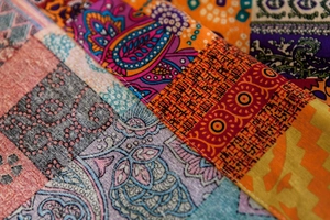 Macro detail of Nordic cotton linen door curtain with bohemian paisley and mandala patterns