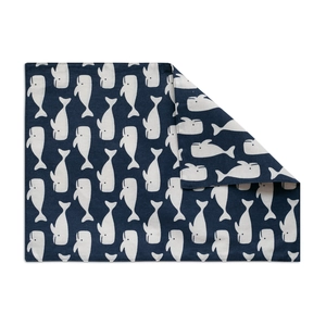 Detail of bohemian whale print placemat showing double-layered fabric and textile texture