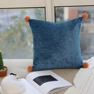 Nordic soft velvet square cushion with orange pom-poms on corners for home decor