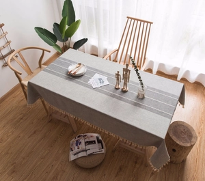 Nordic light grey table cloth with white stripes and delicate cream tassel edge detail