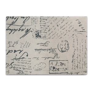 Detailed close-up of retro bohemian placemat with vintage French postal print and stamps