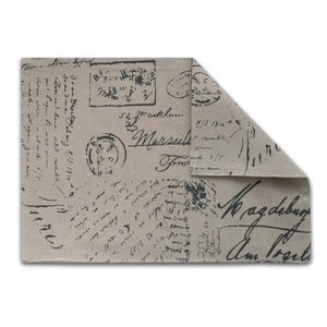 Detail of vintage linen placemat with printed handwritten letters and mail stamps design