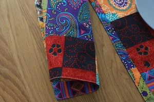 Close-up of Bohemian cotton linen placemat with paisley pattern and stitched edges