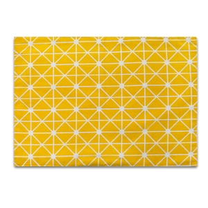 Top view of yellow geometric placemat with white triangle grid pattern and stitched edges