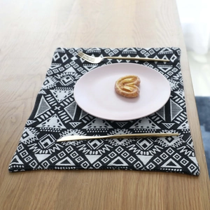 Nordic black and white geometric cotton linen placemat with pink ceramic plate and gold cutlery