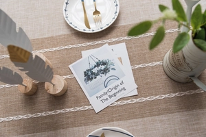 Detail of minimalist khaki linen table runner with white double lace weaving