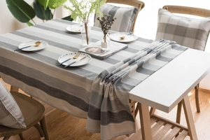 Macro detail of high-quality woven texture on grey striped waterproof tablecloth
