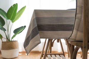 Detailed view of modern minimalist waterproof tablecloth with elegant striped texture