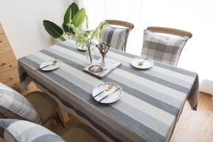 Macro shot of striped waterproof tablecloth with high-quality linen texture and clean edges