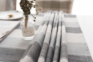 Close-up of minimalist gray and white striped waterproof fabric with premium weave texture