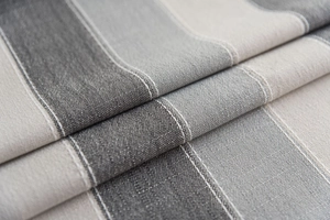 Macro view of Nordic striped waterproof tablecloth showing linen texture and dual stitching