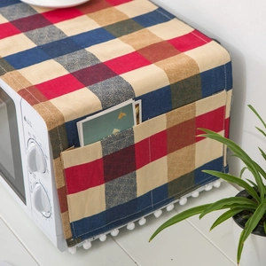 Nordic style plaid microwave dust cover with side pockets and decorative tassels