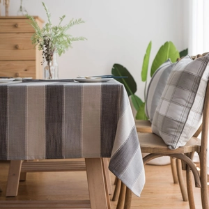 Modern minimalist waterproof striped tablecloth in grey and beige tones for home decor