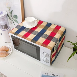Nordic style plaid microwave dust cover with side pockets and white pom pom fringe